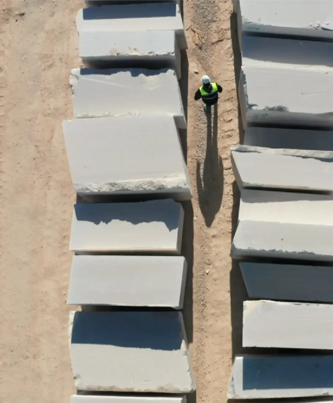 Worker between stone blocks using OnDash software